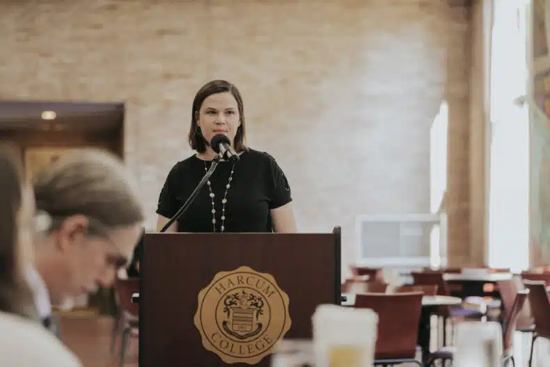 Rachel Bowen speaking at Harcum College event.