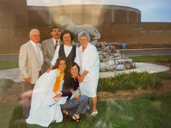Courtney Kelly at her Hollidaysburg Area Senior High School graduation with grandparents and family.