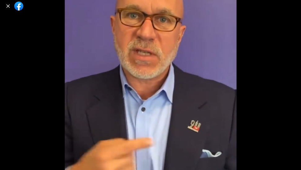 Media personality Michael Smerconish and Steven Singer Jeweler's commemorative 9/11 pin