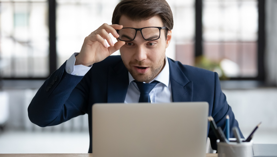 Man staring at his laptop