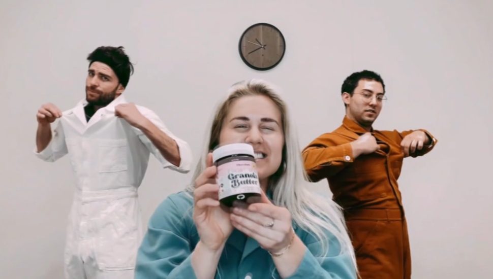 one woman and two men with oat butter