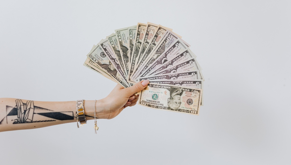 female hand with cash
