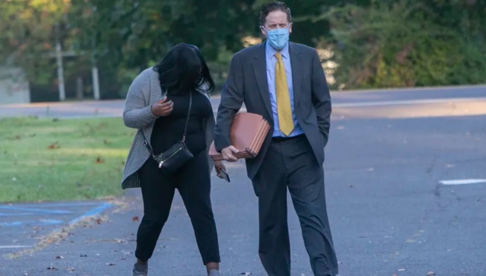 woman with a man wearing a mask