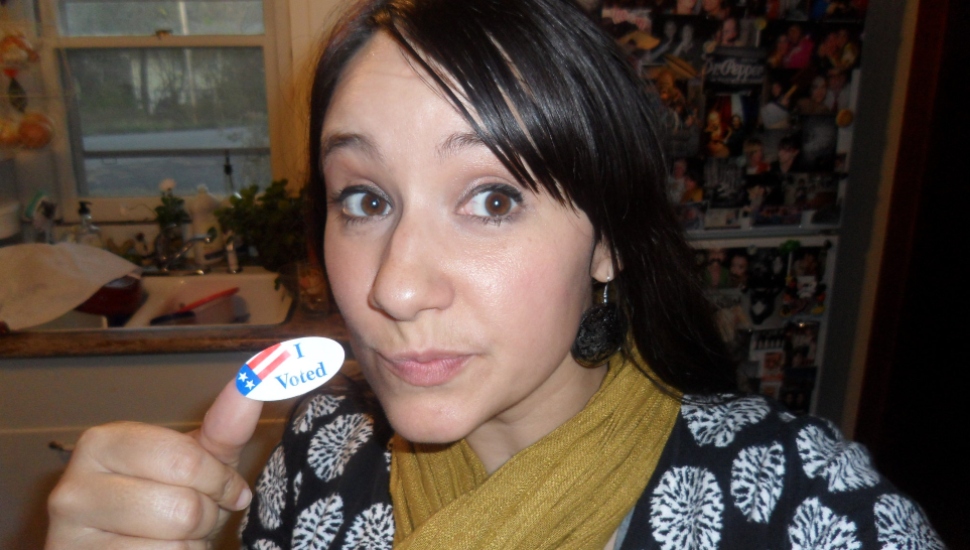 black-haired woman with sticker