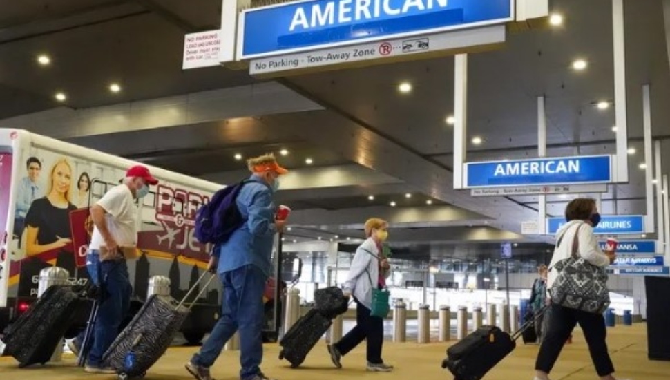 Passengers arrive at Philadelphia International Airport.