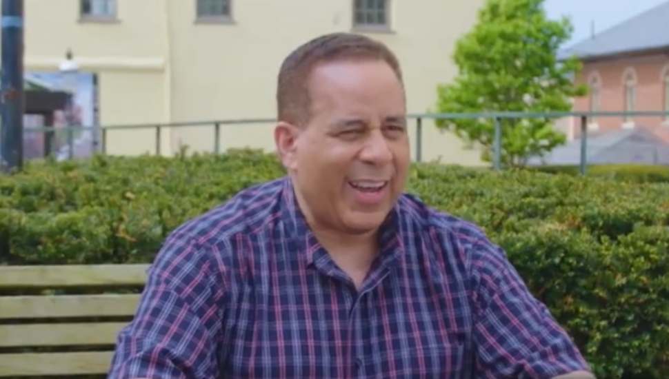 man in blue checked shirt