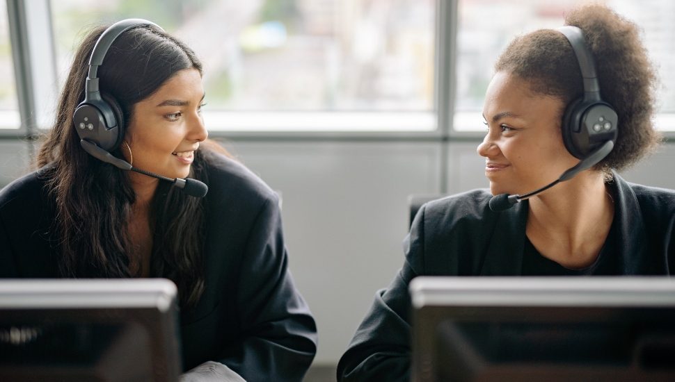 Two telemarketers enjoying a moment together.