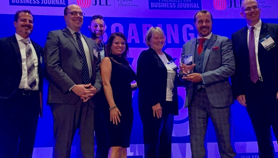 executives accept award