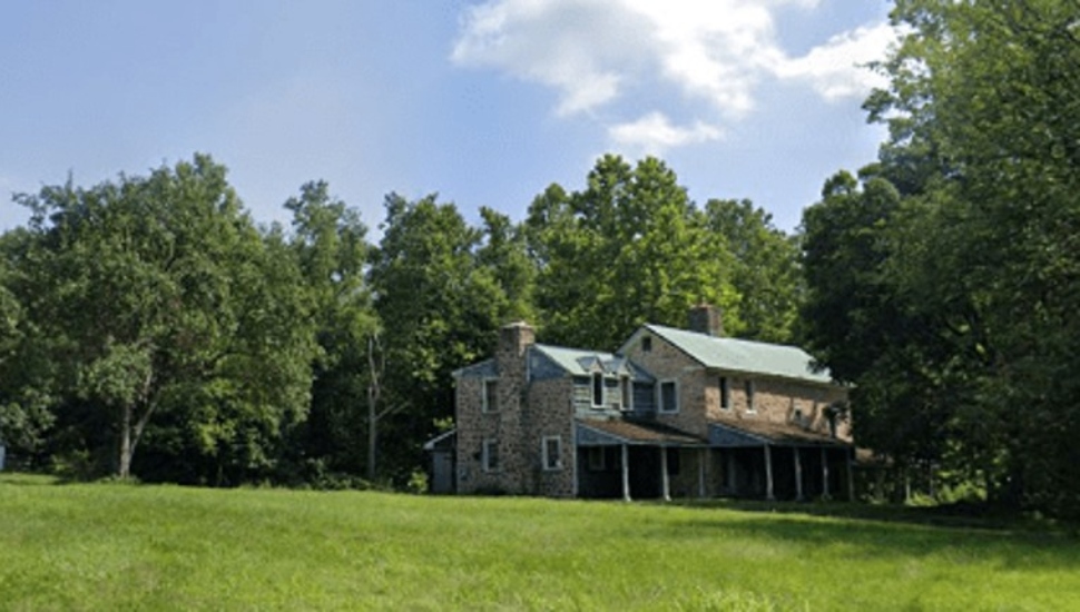 farmhouse in a field