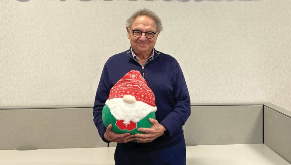 man holding a toy
