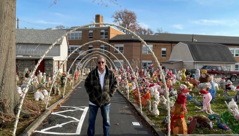 John Colvin stands amid his Colvin Winter Wonderland in Norwood.