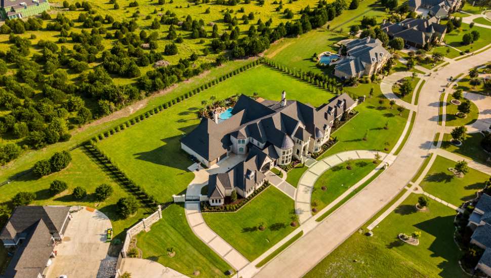 drone shot of large homes