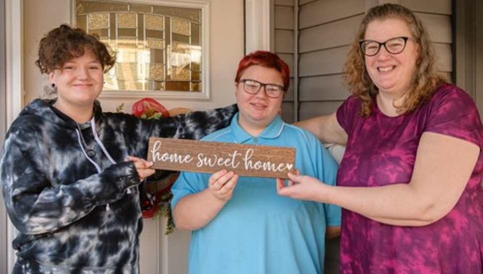 family with sign