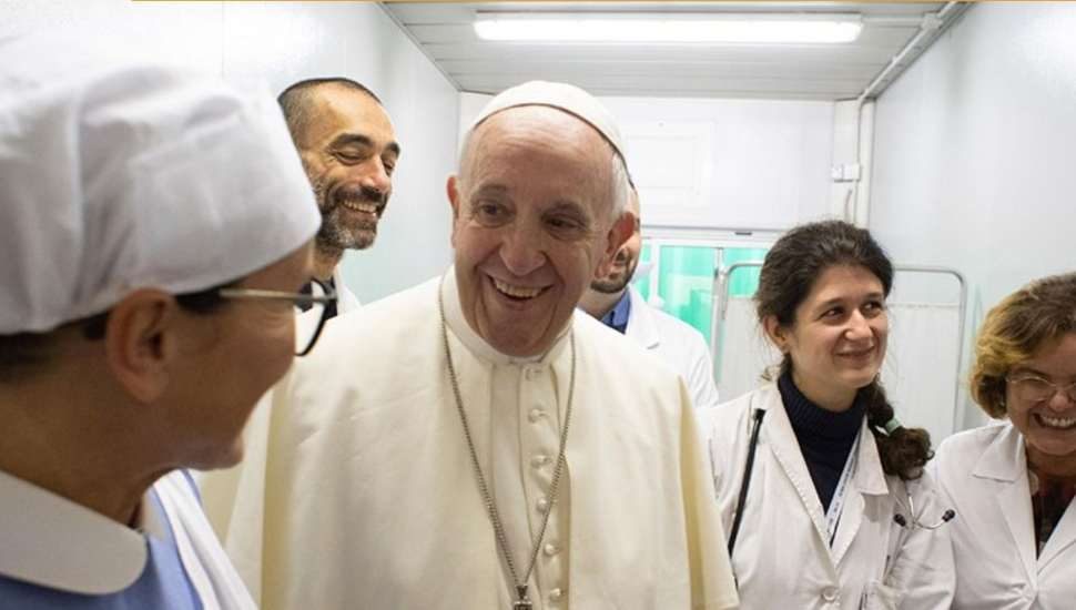 medical staff with man in white