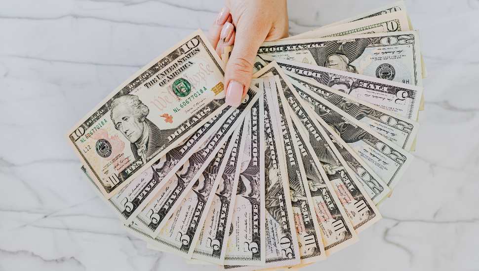 female hand with money