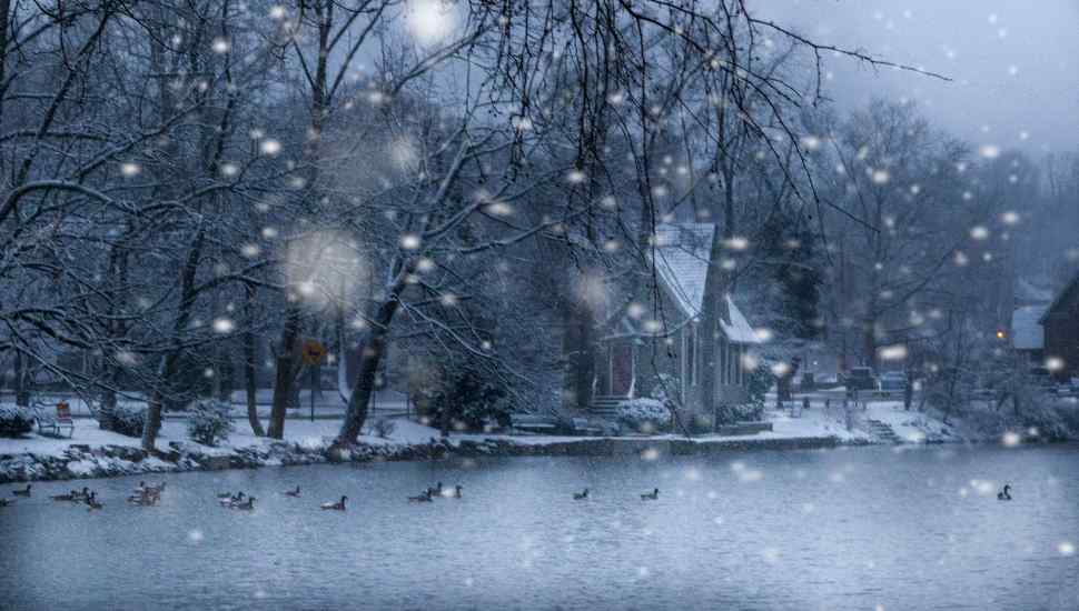 small cottage in snow