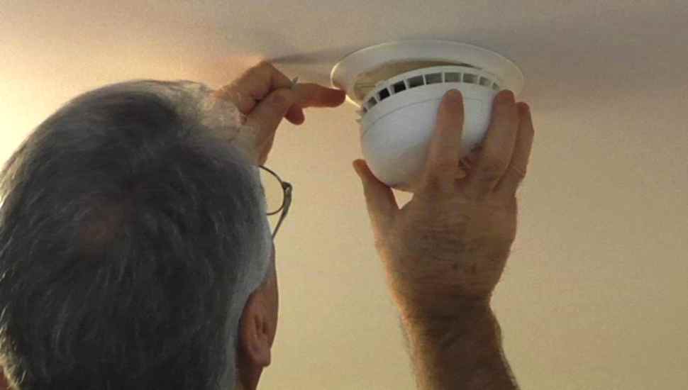 man holding electronic device