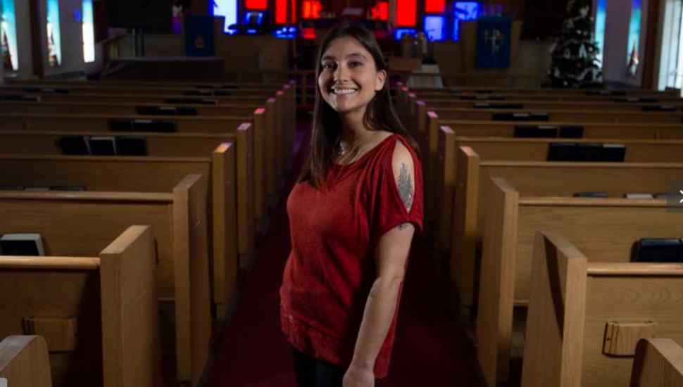 woman in a red blouse in a church
