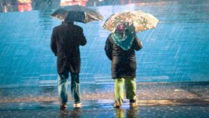 people in the rain