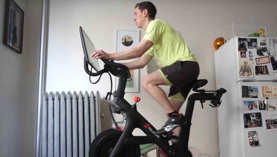 yellow-shirt guy on a bike