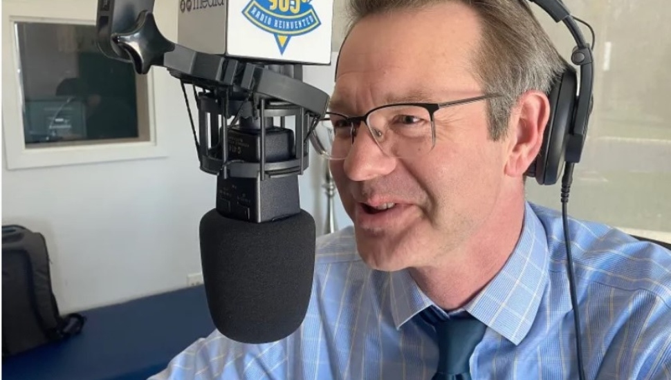 Janis Chakars speaks at Neumann University radio station 98.5 WNUW.