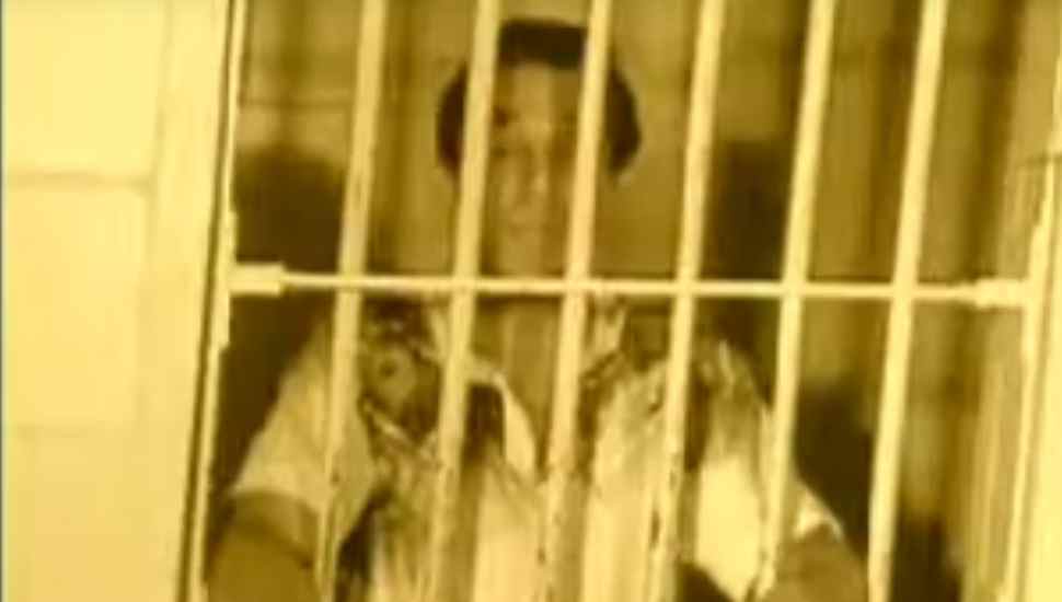 man behind bars