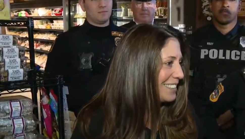 women with law enforcement officers