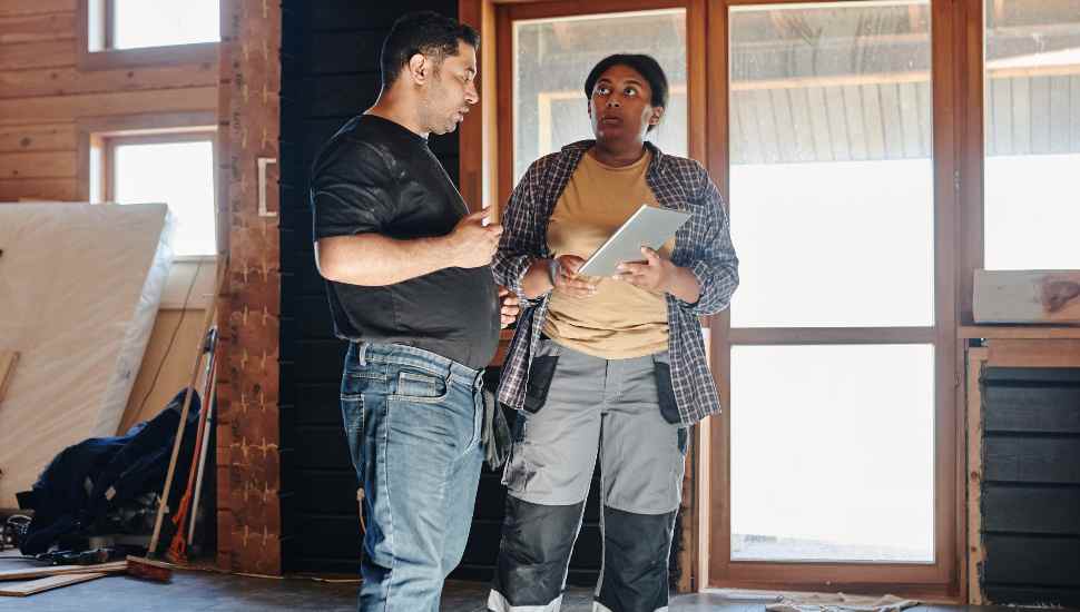 man and woman in building