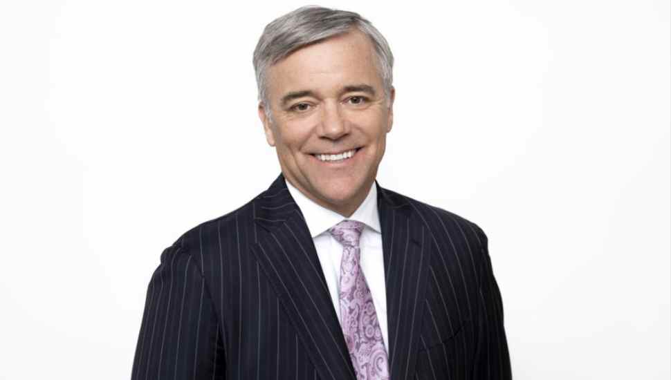 man with purple tie