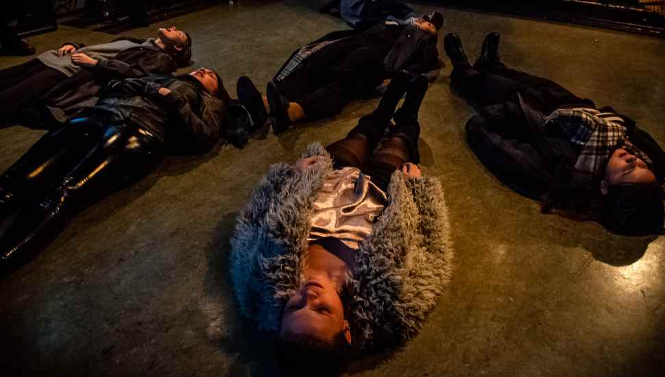 people lying onstage