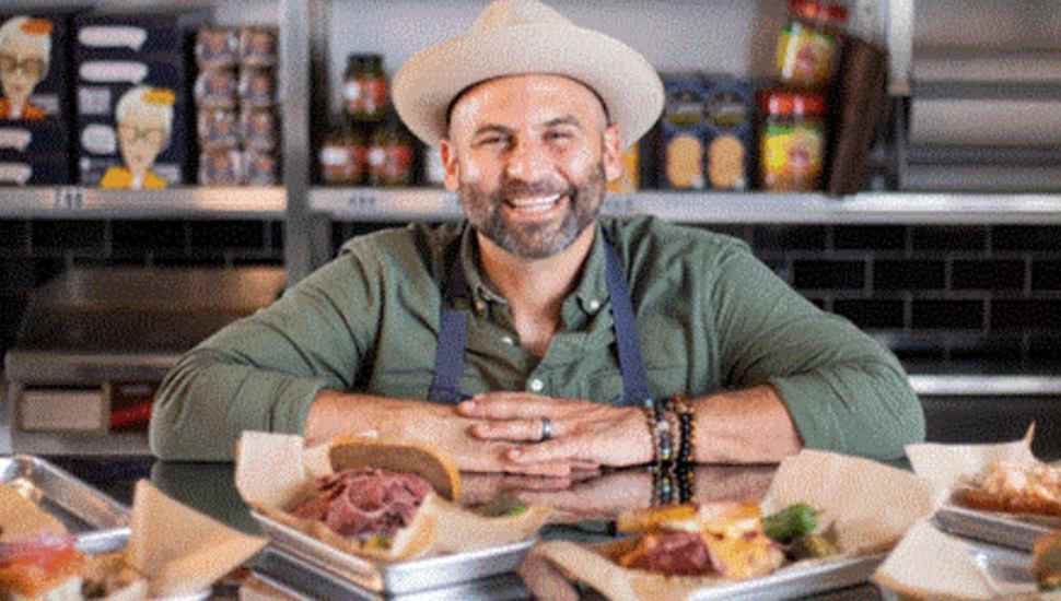 smiling man with hat