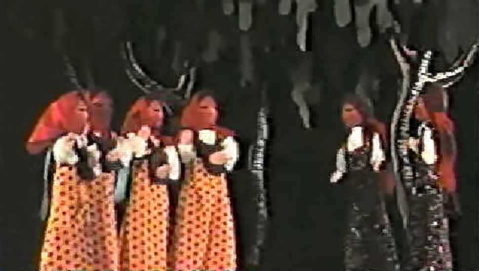 female puppets in the woods