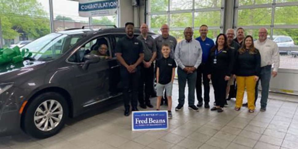Lisa is presented with a Recycled Rides refurbished 2019 Chrysler Pacifica at CARSTAR Fred Beans Doylestown.