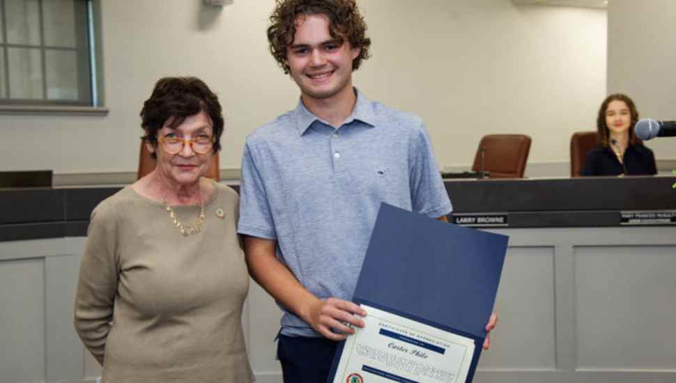 teenager in blue shirt