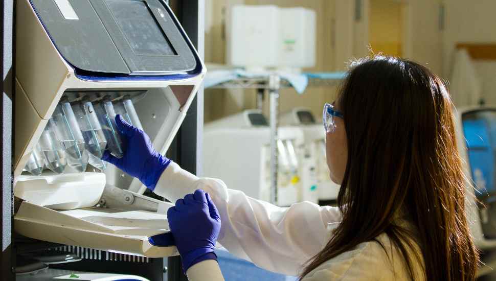 woman with test tubes