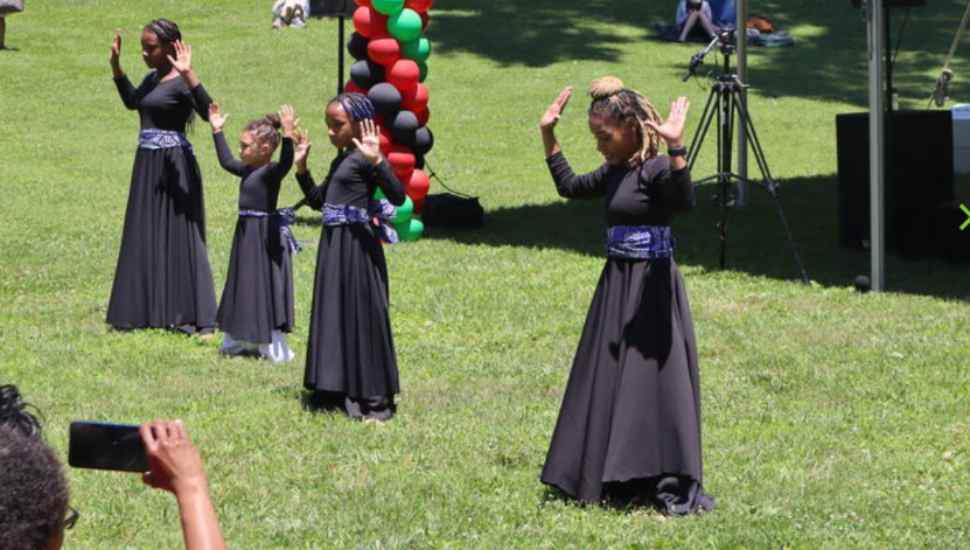 dancers in black dresses