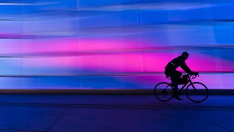 bike aganst neon background