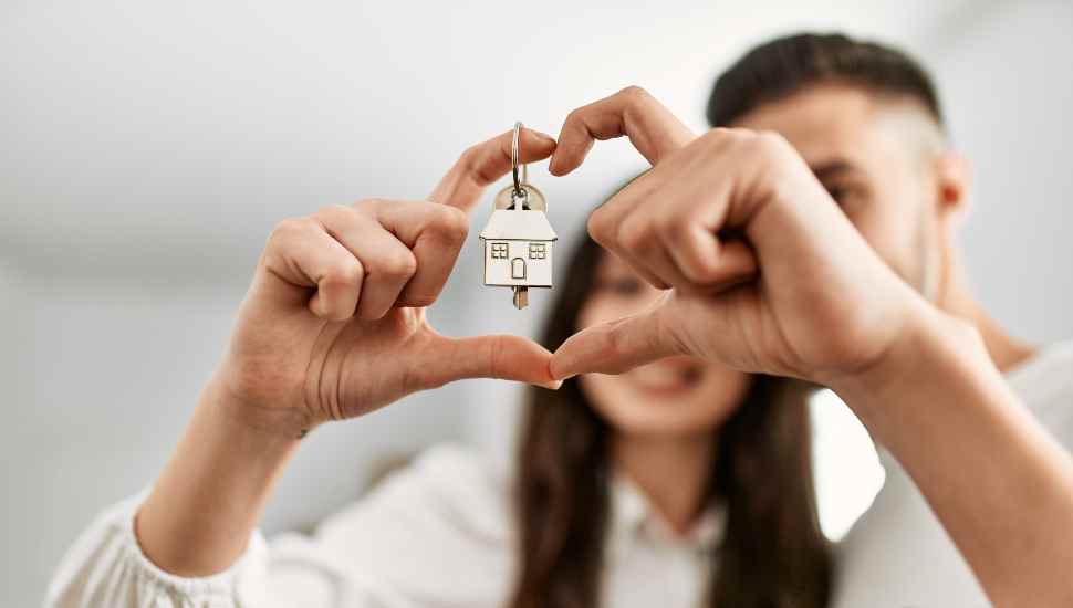 woman holding key