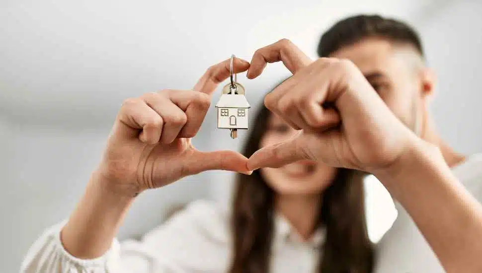 woman holding key