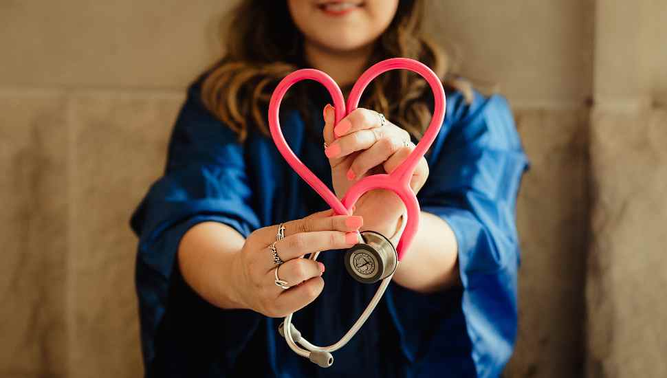 woman with stethoscope
