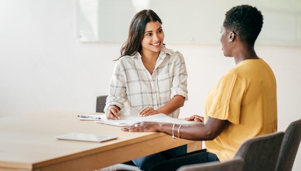 Two Women in an office setting