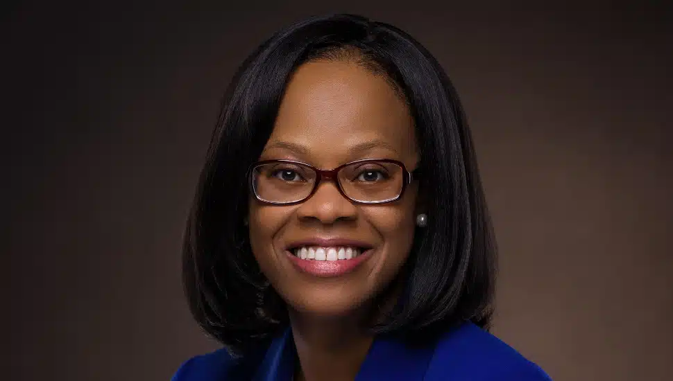 smiling woman with glasses