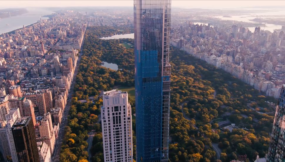 big building in front of a park
