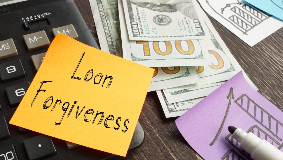 Loan forgiveness is shown using a sticky note