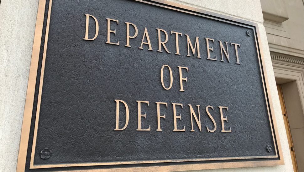 sign with gold letters