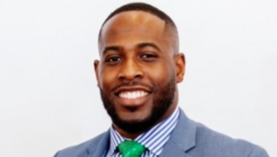 smiling man in a suit