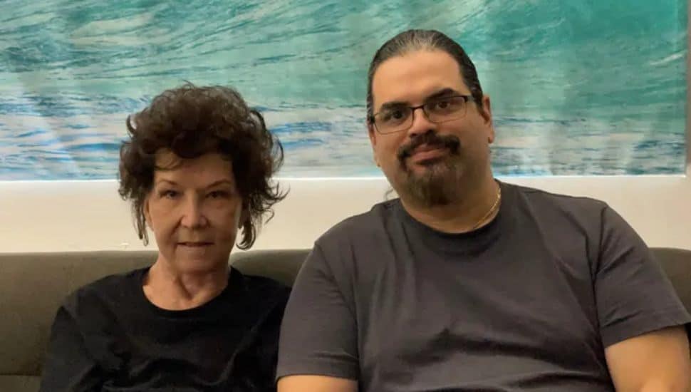 two friends seated side-by-side Chris Wiley and Phyllis Procopio