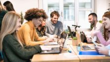 University Students around a conference table