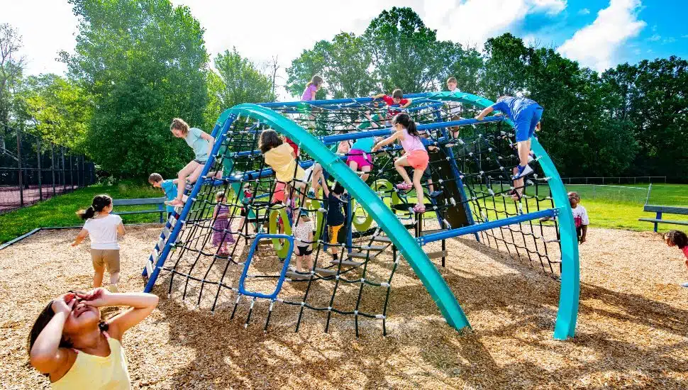 Kids climbing on the Crab Trap.