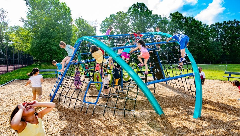 Kids climbing on the Crab Trap.